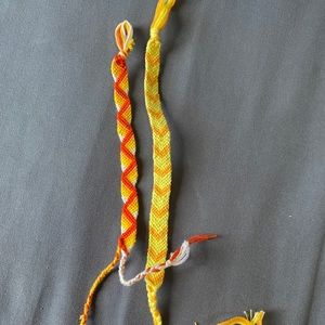 Red, yellow, and orange handmade bracelets!
